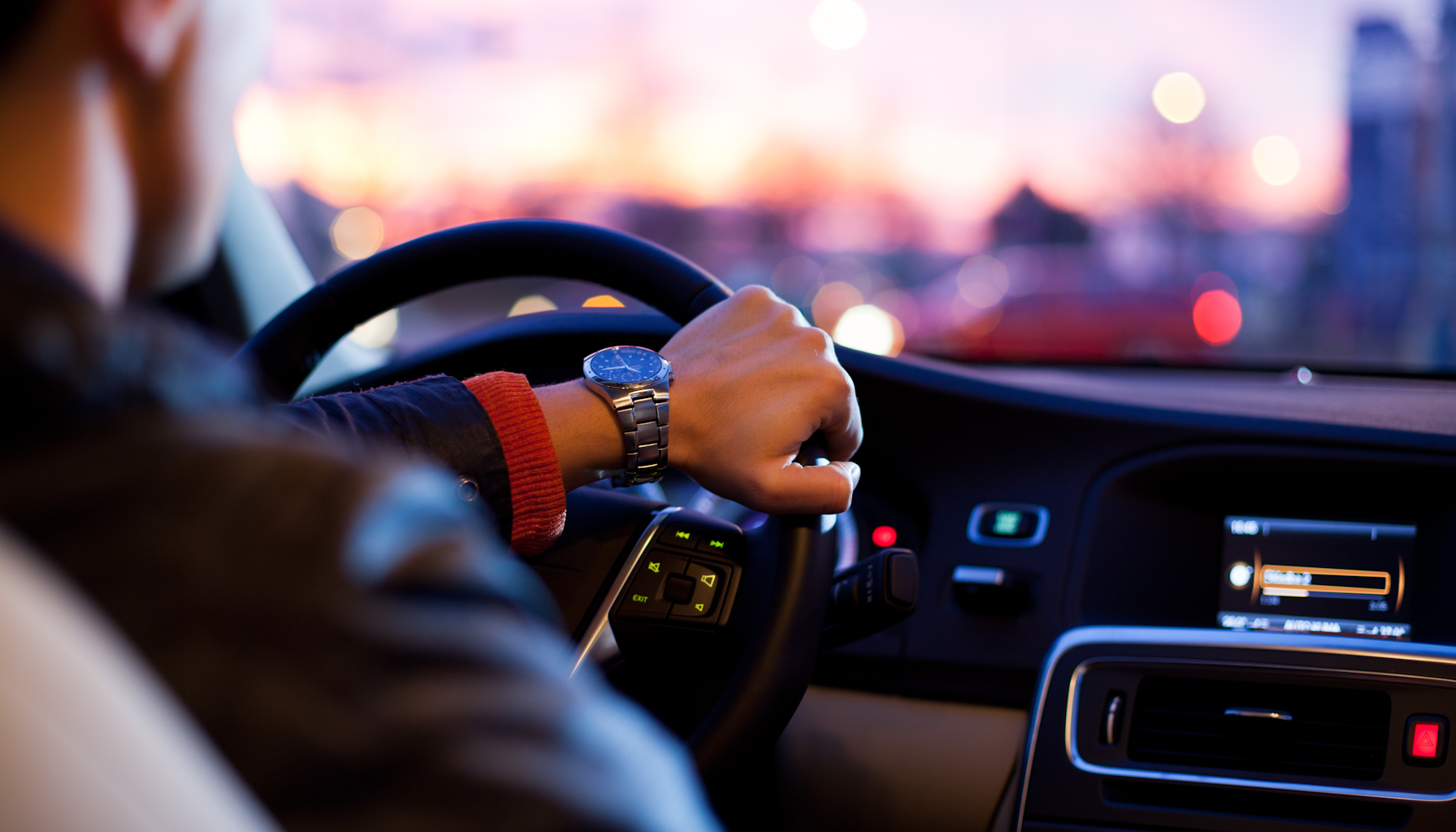Dashboard camera mounted on a car windshield capturing road footage, representing 2026 California auto insurance fraud evidence